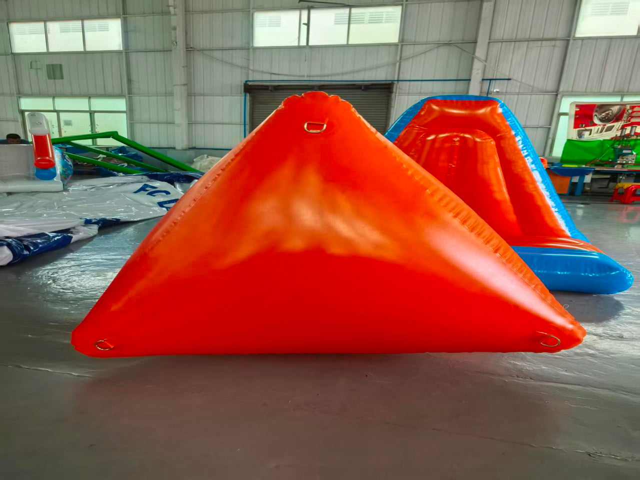 Customizable triangular inflatable buoy