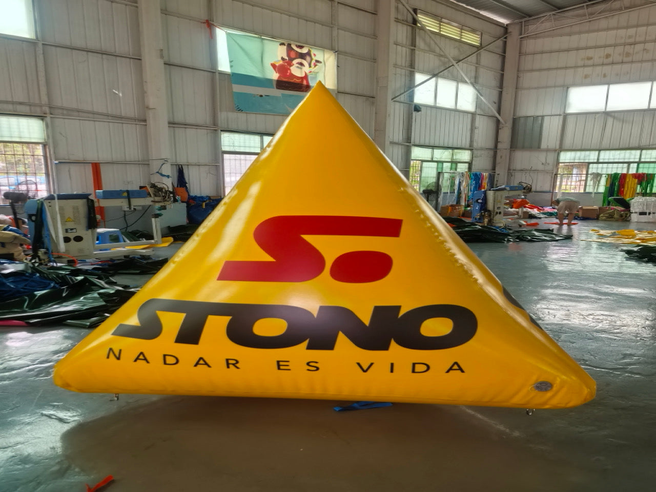 Customizable triangular inflatable buoy