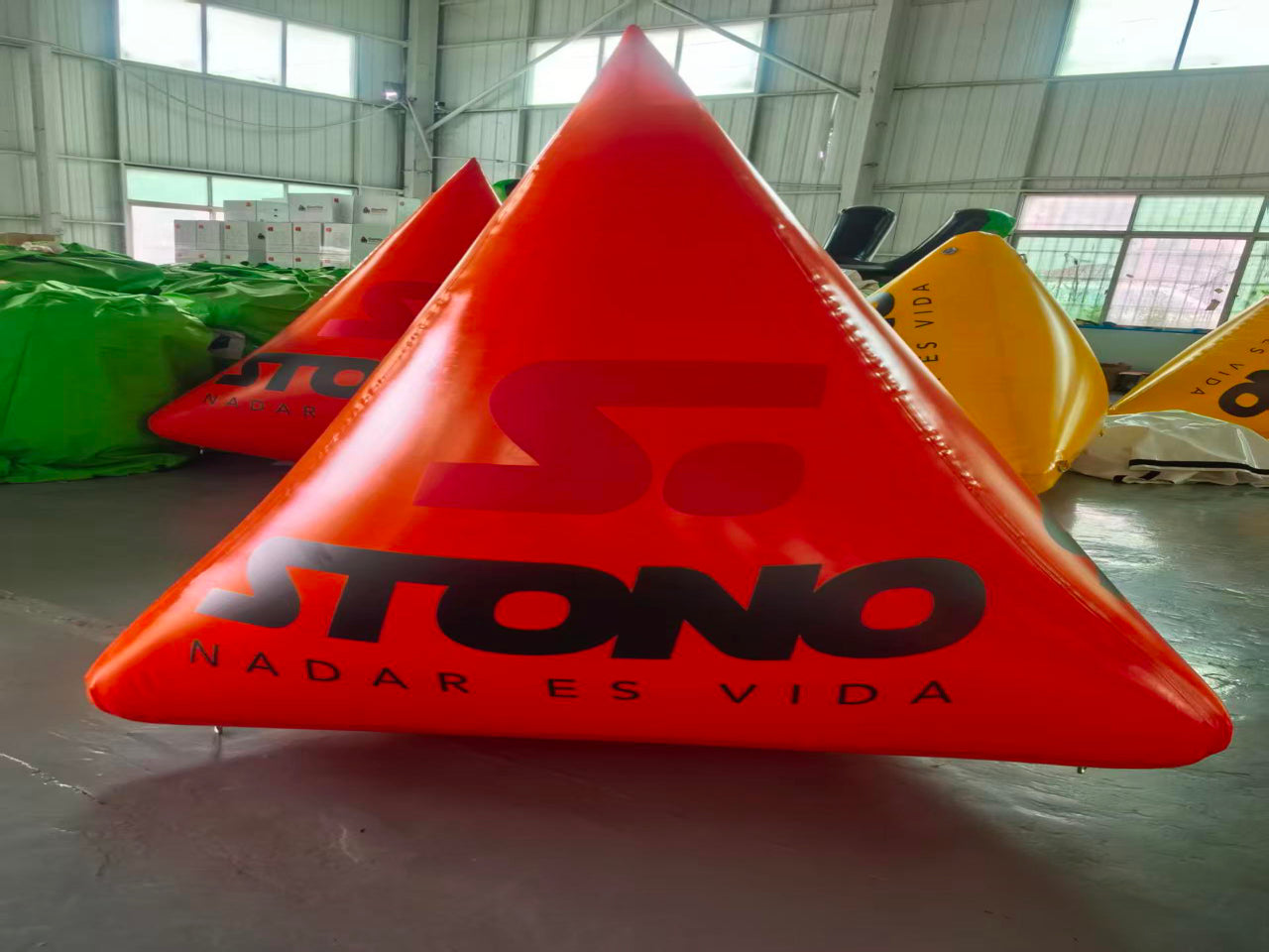 Customizable triangular inflatable buoy